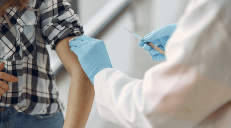 Woman getting vaccinated