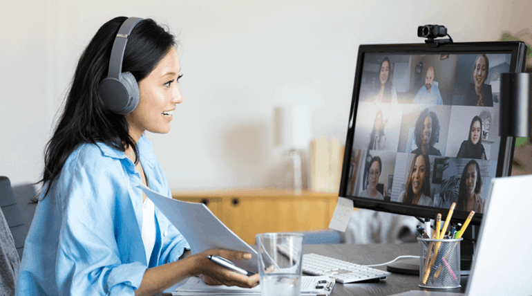 Woman wearing headphones on a virtual call