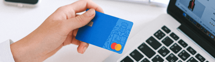 Image of credit card held up