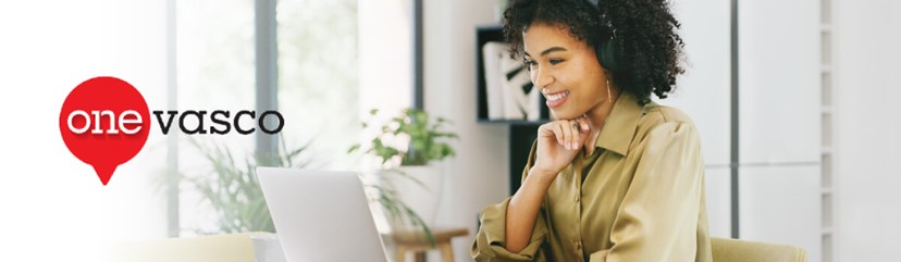 Image of a woman smiling at a laptop with Onevasco Logo overlay