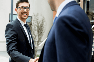 Men shaking hands with smile