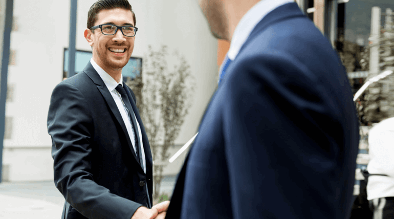 Men shaking hands with smile