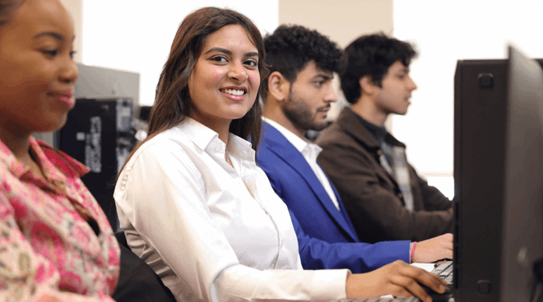 Students attending class in the classroom