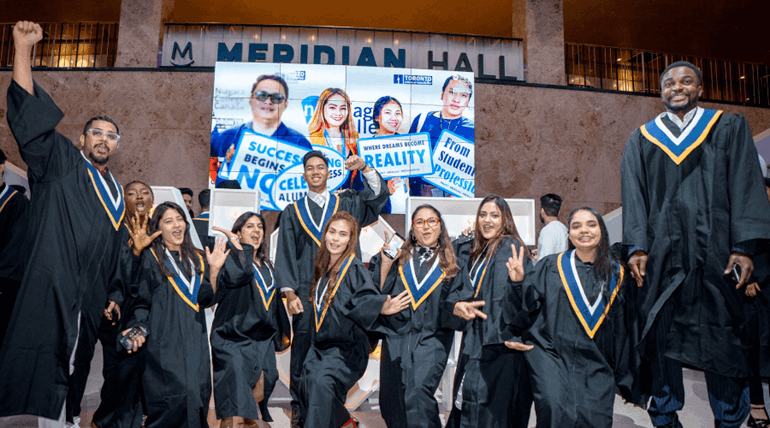 A group of students showing their happy smiles during convocation