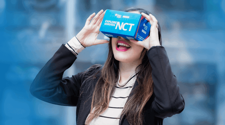 Young lady using VR headset