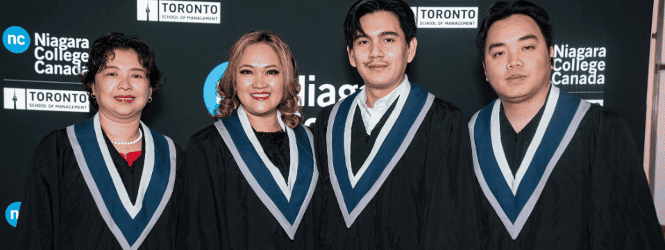 Group of graduates posing together